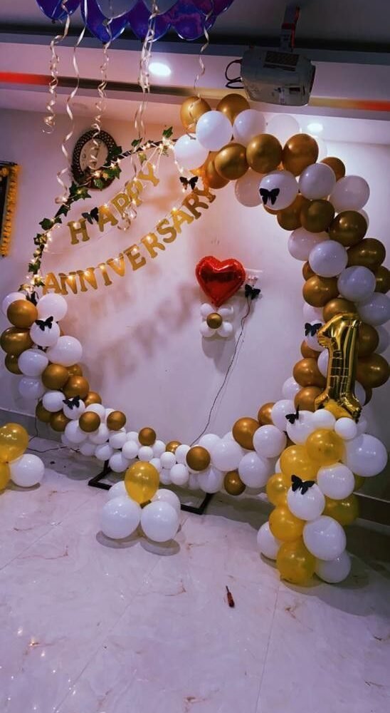 White and yellow Anniversary Balloon Setup