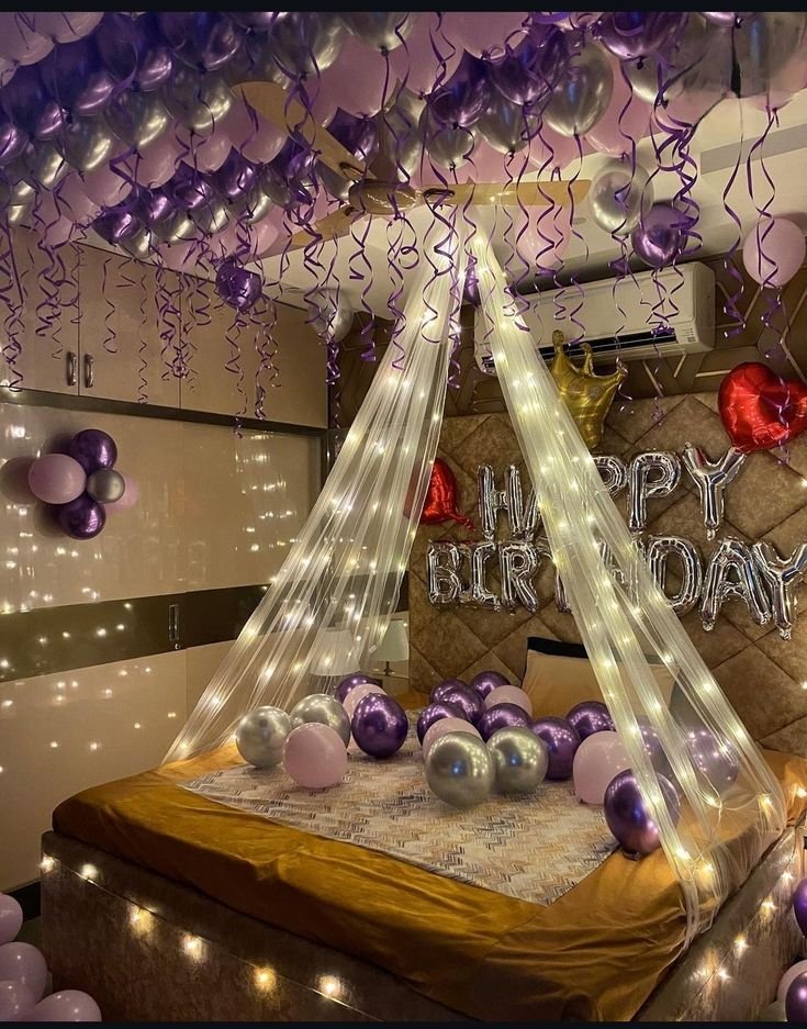 Surprise room birthday decoration in Mumbai with balloons and candles